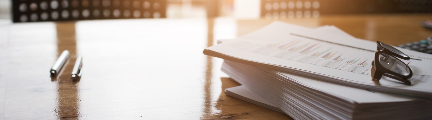 Stack of forms on a table