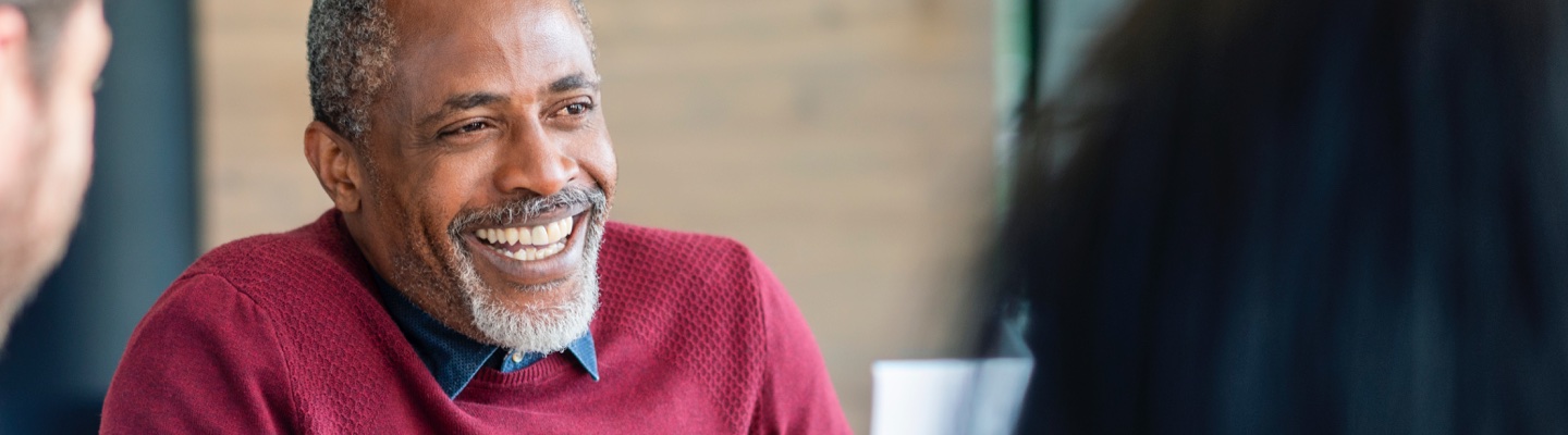 Happy man in office